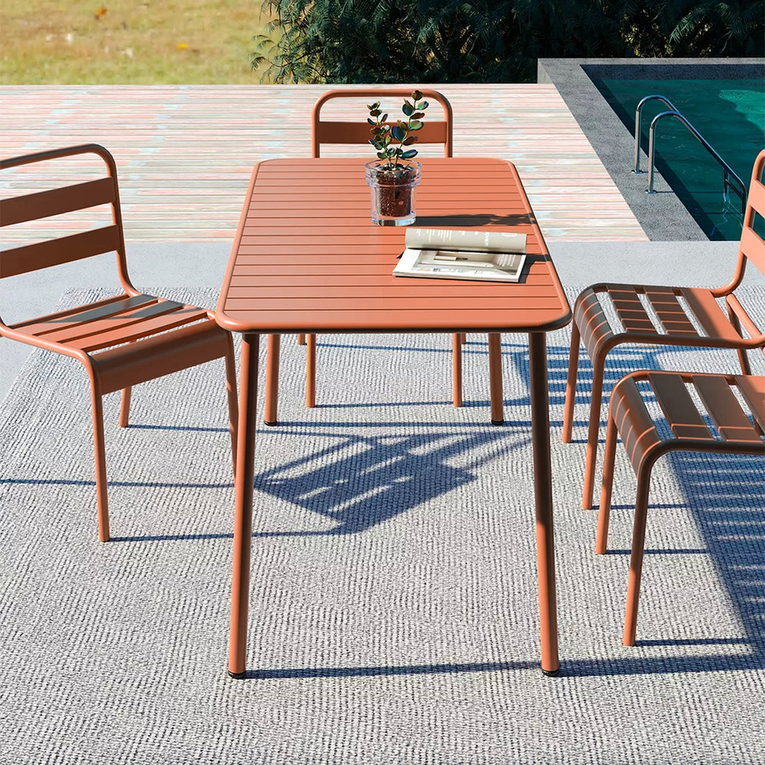 Mesa de Exterior Formentera Naranja en terraza, foto ambientada